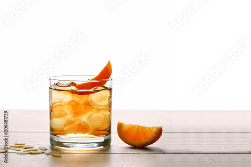 Fotografie godfather cocktail with orage and alcohol