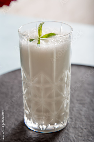 Ayran - liquid drink made from yogurt in ransparent glass cup