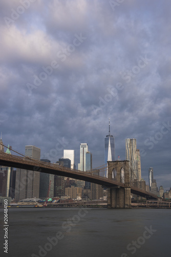 Amazing morning sky over Manhattan skyline and Brooklyn Bridge in New York City © TetyanaOhare