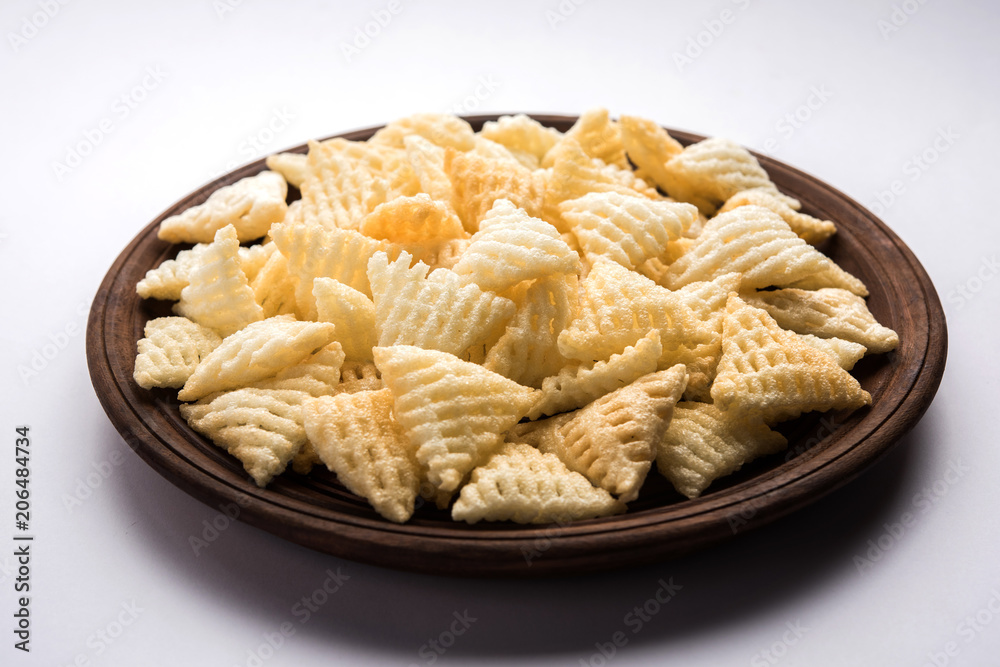 Basundi Or Rabri is an Indian sweet popular in Gujarat and Maharashtra. It is a sweetened condensed milk. Garnished with Dry fruits and Saffron. Served in a bowl over moody background. Selective focus
