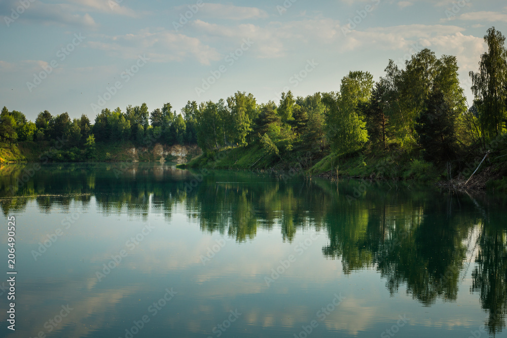Turquoise lake Wapienniki near Sulejow, Lodzkie, Poland