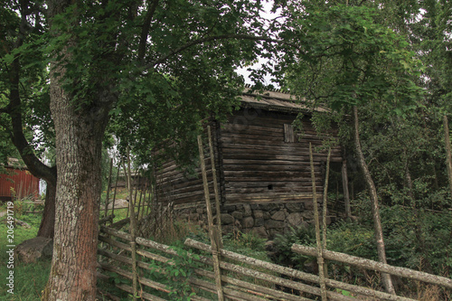 Stockholm's old wooden townhouse and its beautiful garden with flowers.