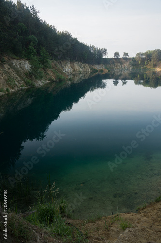 Turquoise lake Wapienniki near Sulejow, Lodzkie, Poland