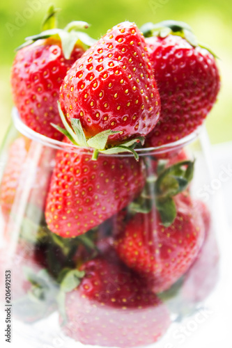 Fresh strawberries in a glass goblet. Dessert made from fresh strawberries. Selective focus.