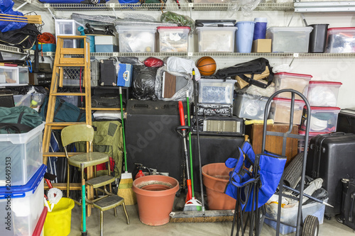 Messy cluttered garage fill...
