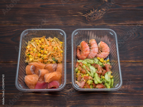 Vászonkép Seafood and vegetable salad take-away