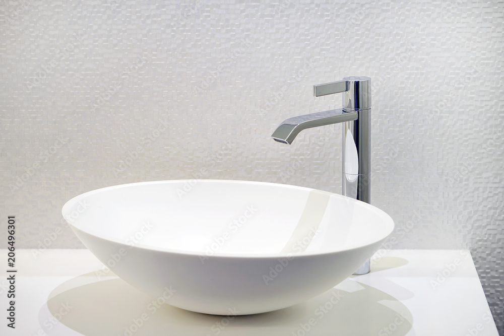 Fototapeta premium Bathroom interior sink with modern design. Interior of bathroom with washbasin and faucet