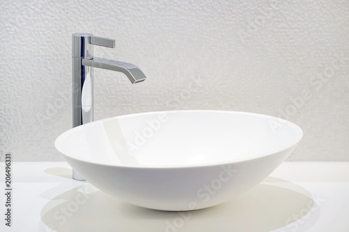 Bathroom interior sink with modern design. Interior of bathroom with washbasin and faucet