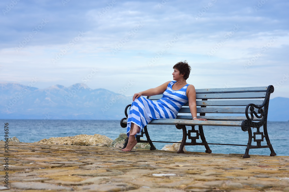 Woman on a bench, Greece