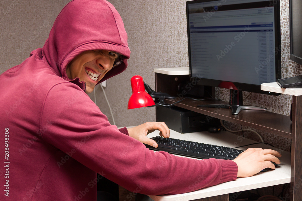 Internet Troll Is Mean At The Computer Stock Photo - Download