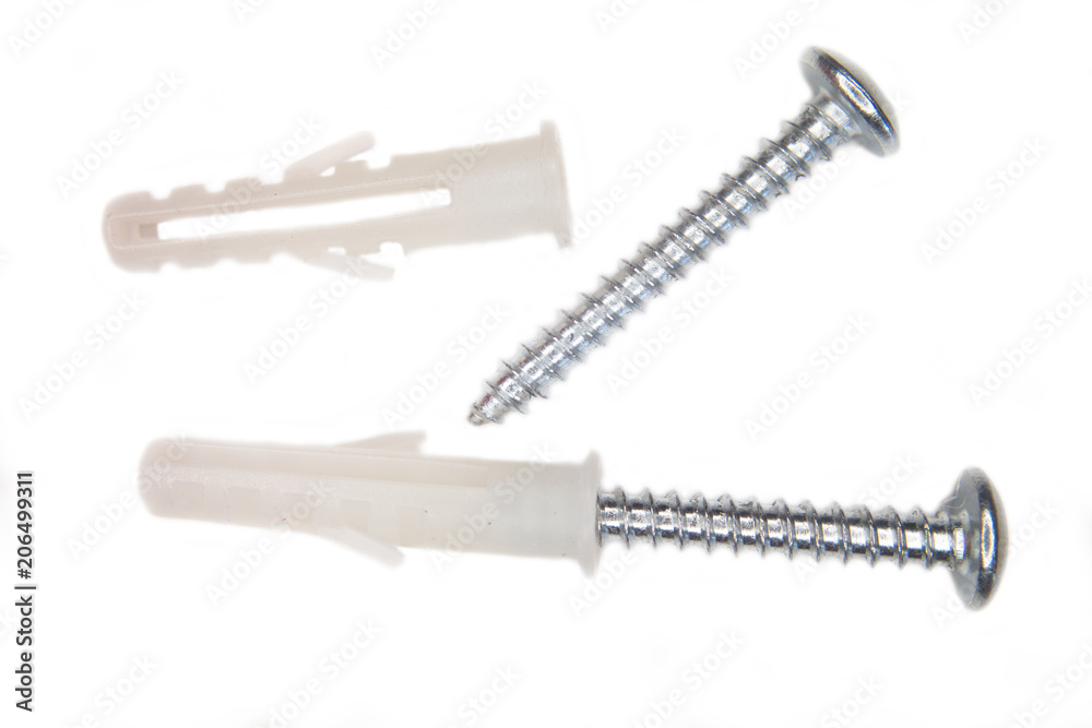 Screws and dowels on a white background