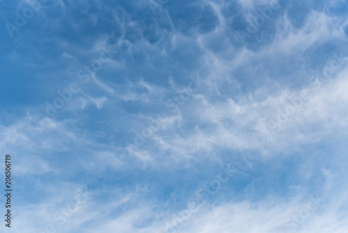 Blue sky with white clouds background