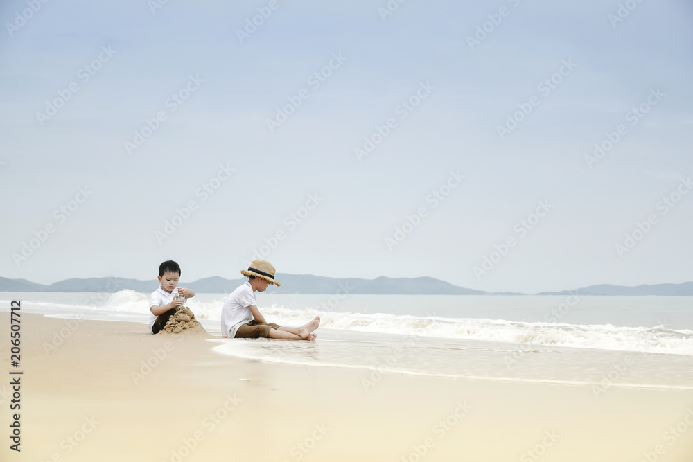 happy family with two kids on the beach, happy family with two kids on the beach,
