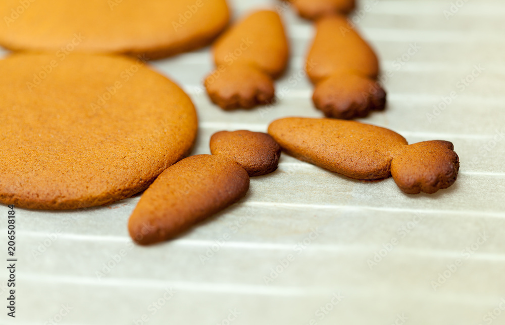 Fototapeta premium close up of female hands making cookies from fresh dough at home
