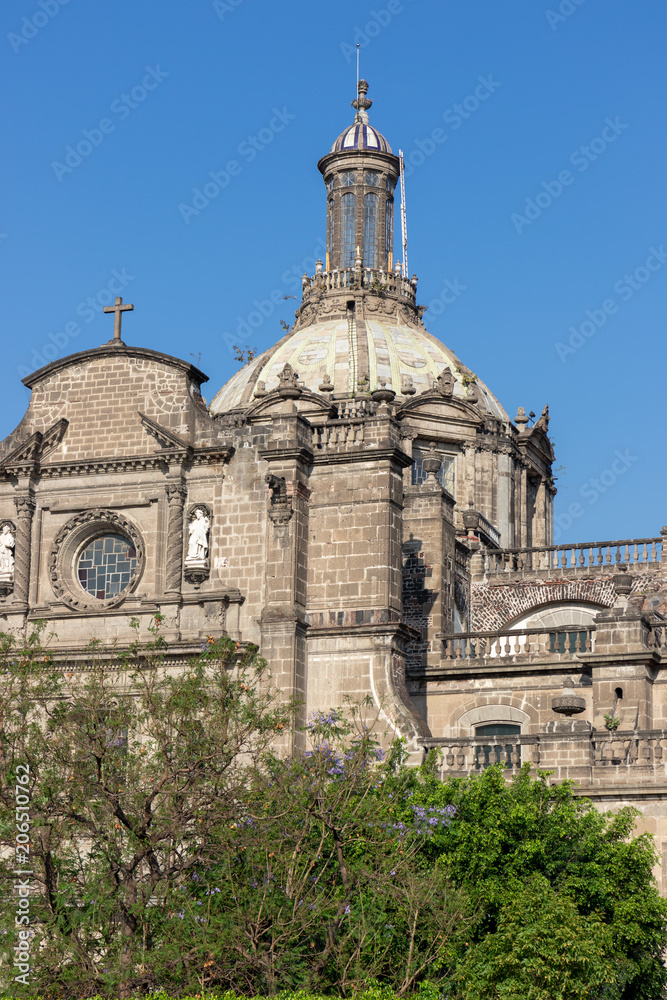 Facade of a beautiful, old cathedral at Zocalo Square in Mexico City