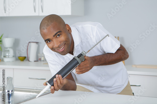 plumber fixing a sink