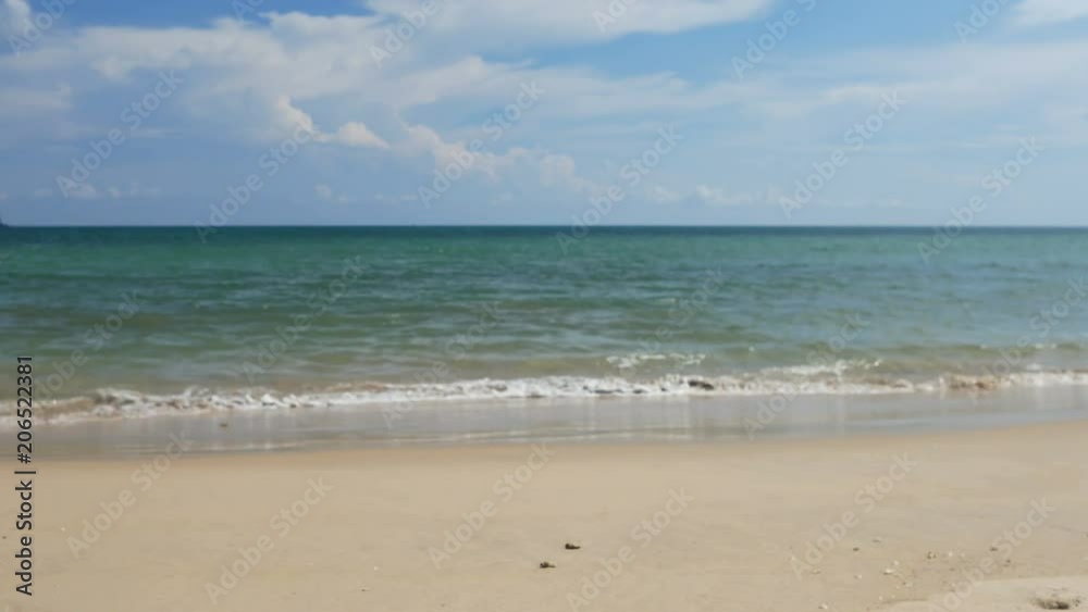 Beautiful sand beach with soft wave in sea water , cloudy blue sky sunny day Beautiful sand beach with soft wave in sea water , cloudy blue sky sunny day
