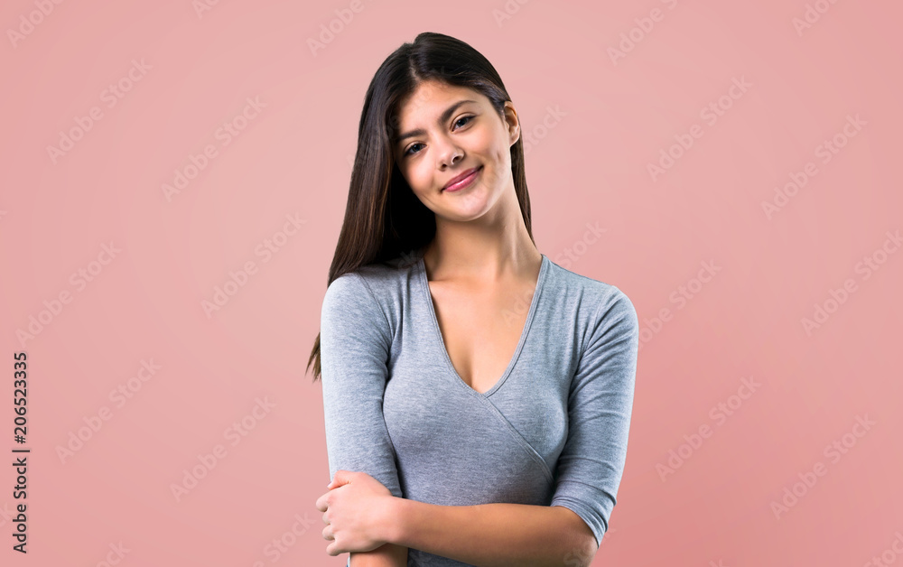 Teenager girl on pink background Teenager girl on pink background