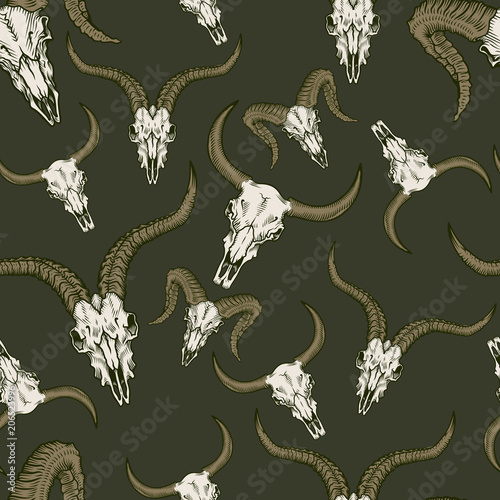 Seamless pattern with animal stock skulls illustrations in engraving technique.