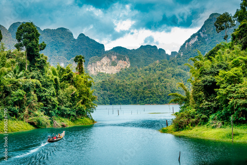 Photography Mountain scenery with with tropical rain forest in the background and blue water