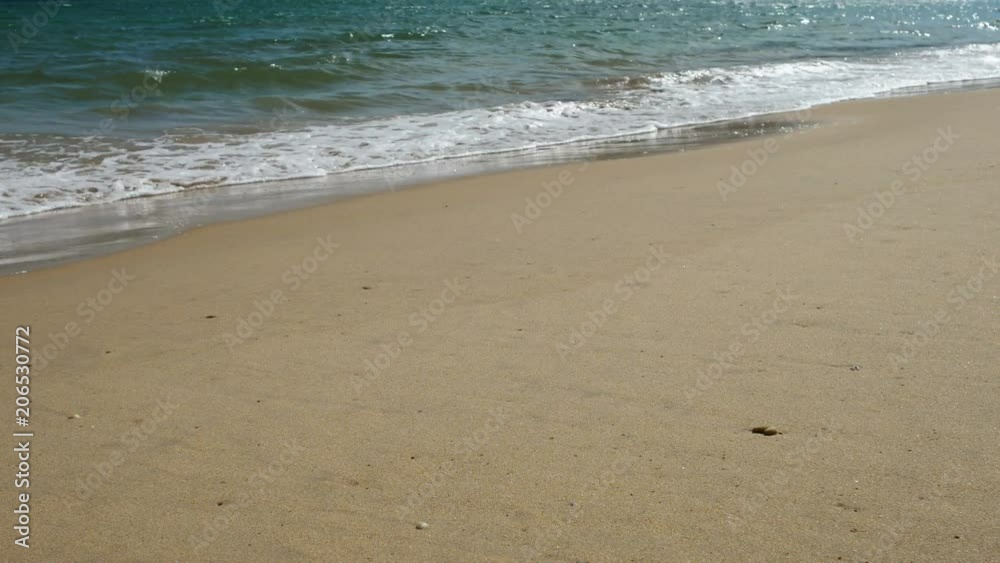 Beautiful sand beach with soft wave in sea water , cloudy blue sky sunny day Beautiful sand beach with soft wave in sea water , cloudy blue sky sunny day