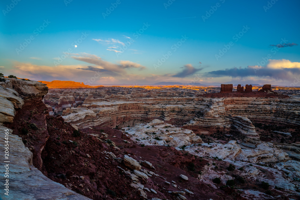 I captured this sunset image from the Maze Overlook in  the remote Maze District of the Canyonlands National Park in Utah. This is an area of rough 4 wheel drive roads and spectacular scenery.