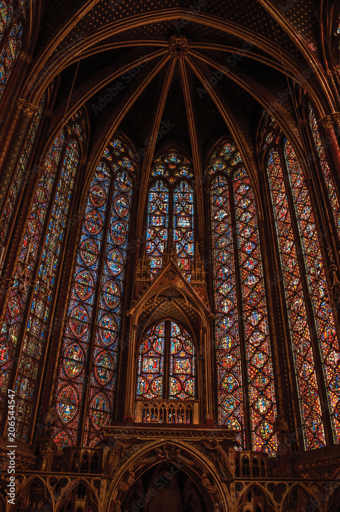 Paris, Northern France - July 08, 2017. Stained glass windows and baldachin at the Sainte-Chapelle (church) in Paris. Known as the “City of Light”, is one of the most awesome world’s cultural center. 