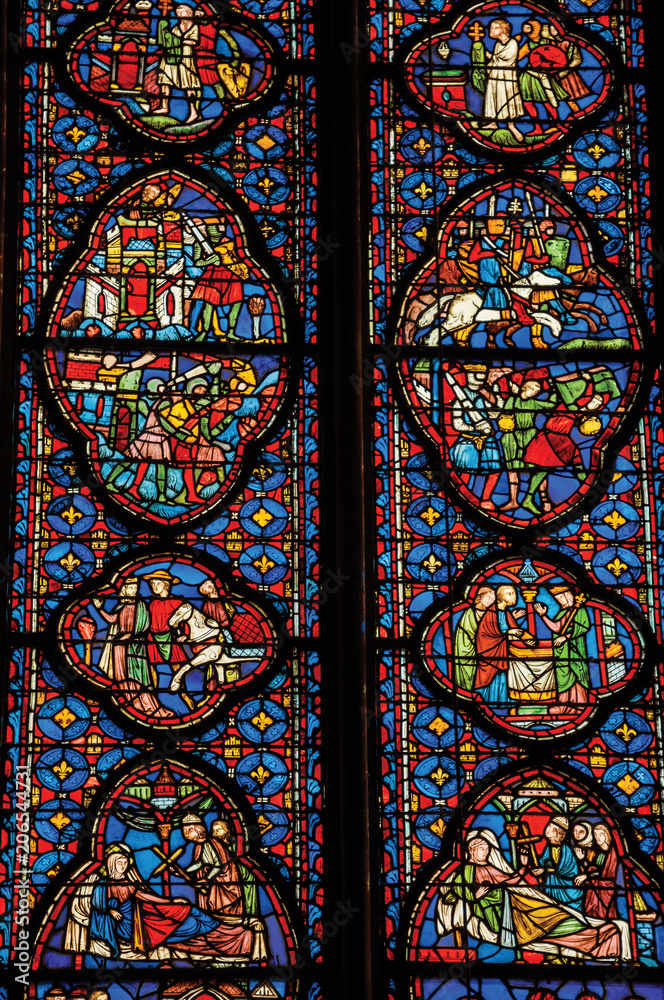 Detail of Stained glass window at the gothic Sainte-Chapelle (church) in Paris. Known as the “City of Light”, is one of the most awesome world’s cultural center. Northern France.