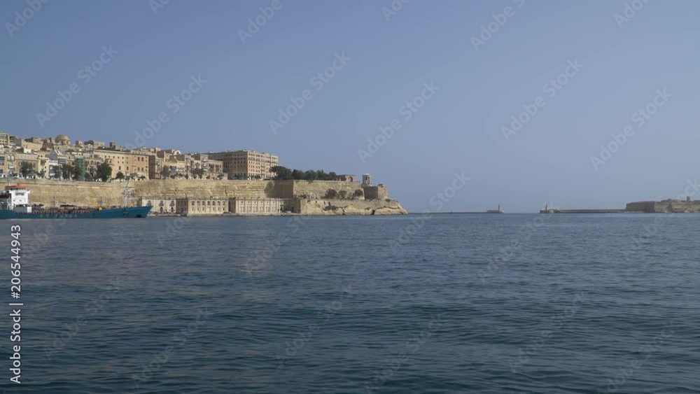 VALLETTA - MALTA, April, 2018: View of the Mediterranean Sea,Valletta and the island of Malta from water taxi. VALLETTA - MALTA, April, 2018: View of the Mediterranean Sea,Valletta and the island of Malta from water taxi.
