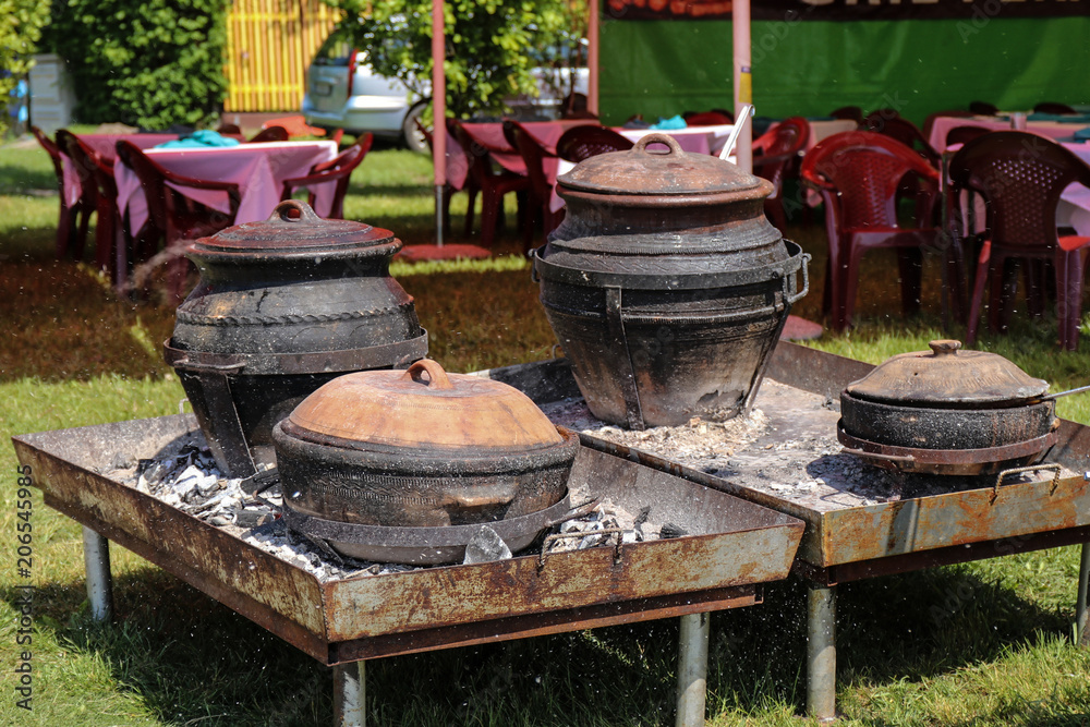 Large cauldrons for cooking hot dishes Large cauldrons for cooking hot dishes
