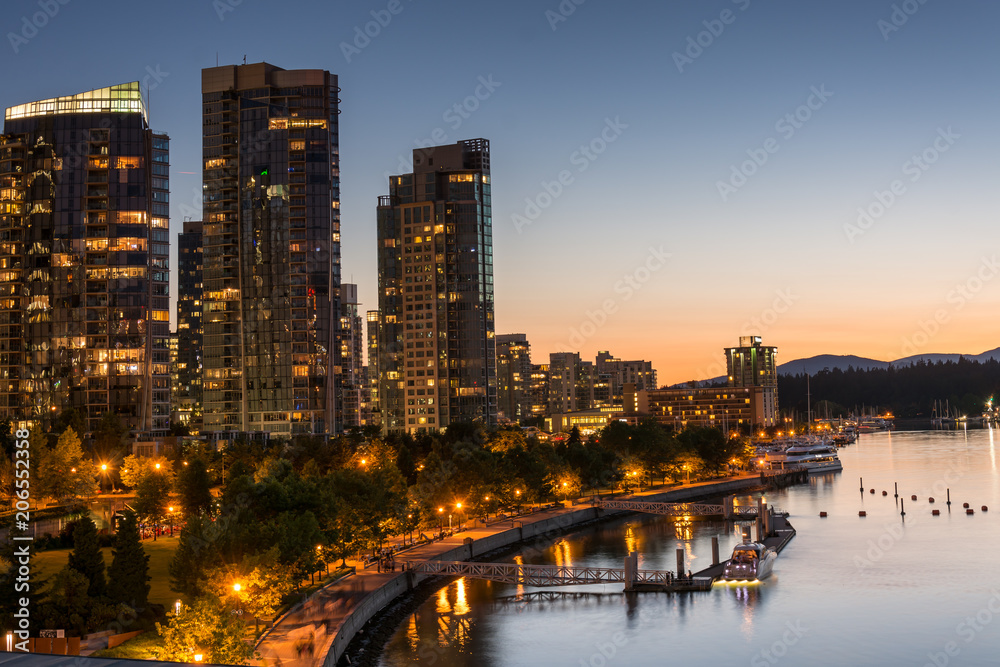 Skyline of Coal harbour at sunset in Vancouver British Columbia 