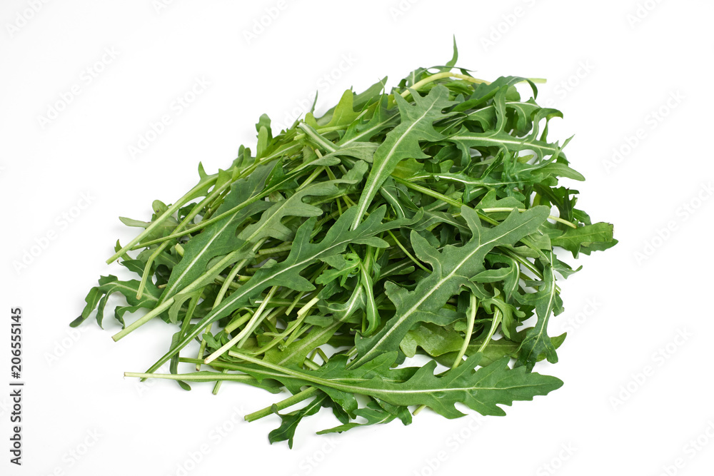 green fresh ruccola isolated on white background, close up studio shot green fresh ruccola isolated on white background, close up studio shot
