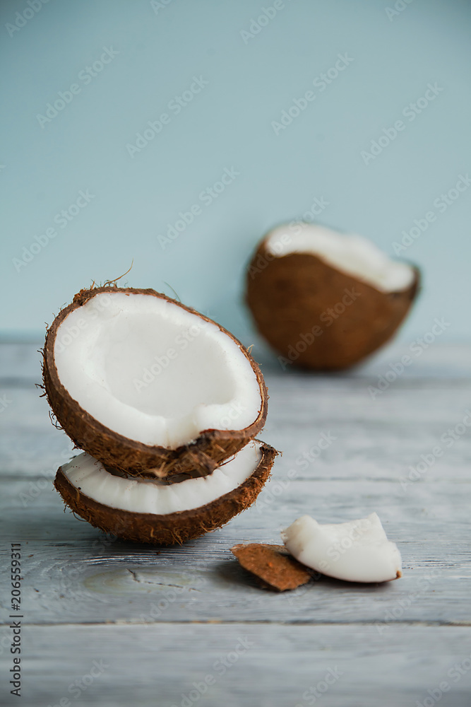 Fresh organic coconut on rustic wooden background Fresh organic coconut on rustic wooden background