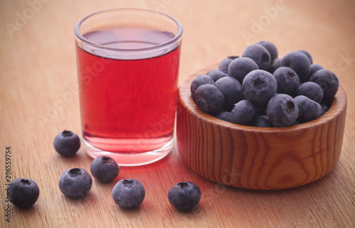 Group of fresh blueberries with juice