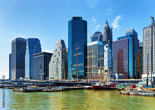 Ships in harbor of South Street Seaport East River NY