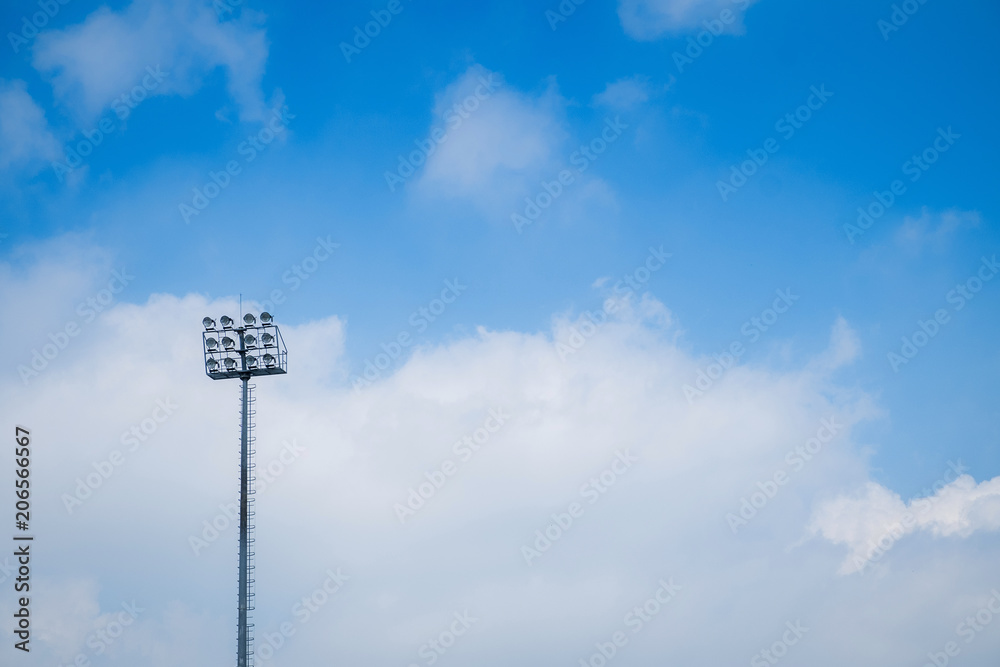 Small sports light with blue sky