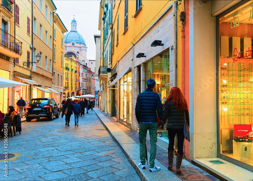 Fototapeta Naklejka Na Ścianę i Meble -  People on Via Roma street Mantua Lombardy