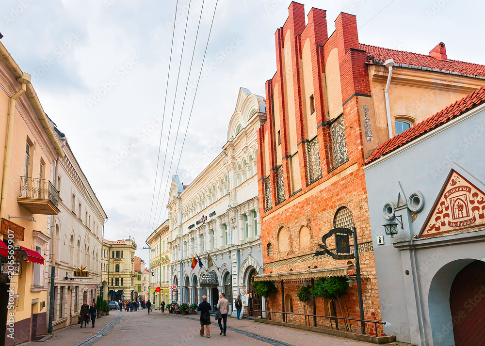 Tourists and old architecture in historical center of Vilnius Lithuania