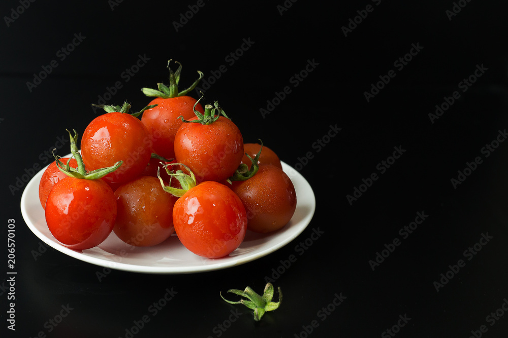 close up fresh tomato on black table background. close up fresh tomato on black table background.