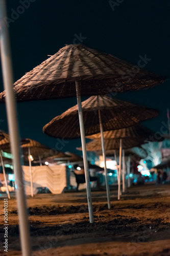 thatched sun shade at night