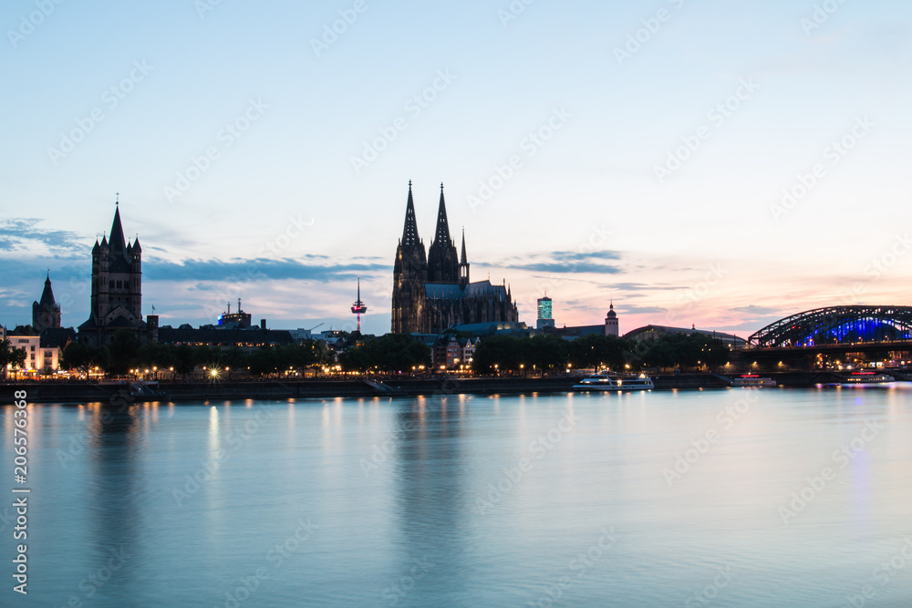 Cologne Cathedral reflecting in River Rhine at Sunset 
