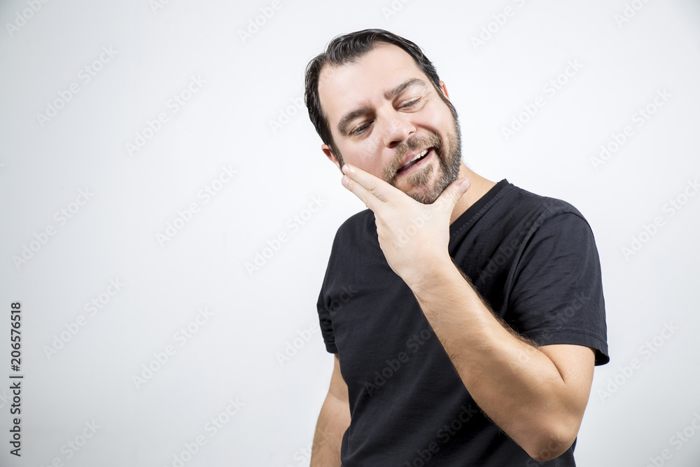 Man is touching his beard like won something on white background Man is touching his beard like won something on white background