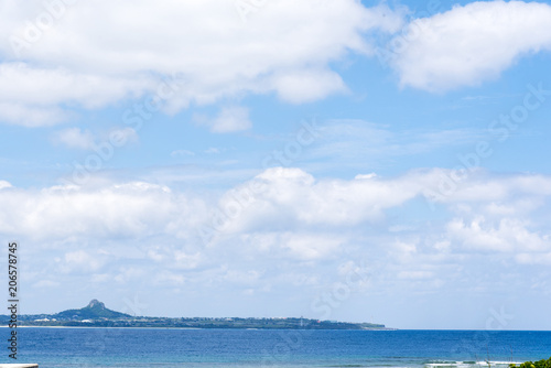 Beautiful ocean view with blue sky and Ie island, Okinawa, Japan