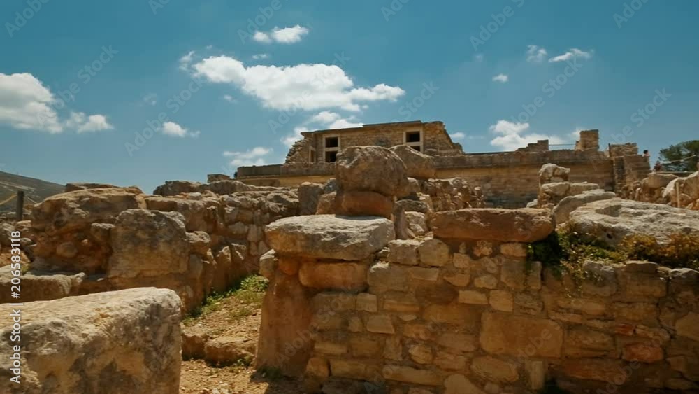 Crane shot revealing the southern entrance to the complex of the Minoan Palace of Knossos, Heraklion, Crete, Greece. Crane shot revealing the southern entrance to the complex of the Minoan Palace of Knossos, Heraklion, Crete, Greece.