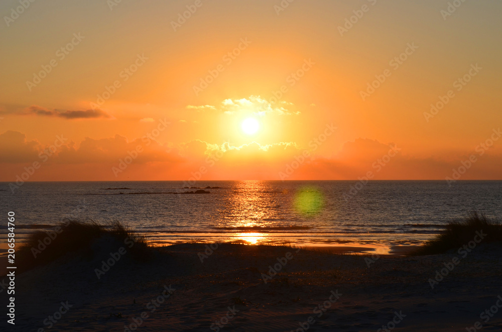 beautiful sunset on the Atlantic Ocean, beach in Viana do Castelo, Portugal beautiful sunset on the Atlantic Ocean, beach in Viana do Castelo, Portugal