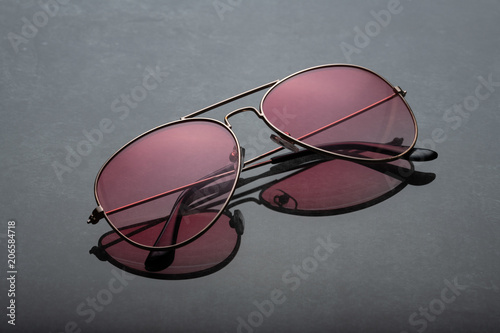 Pink sunglasses.