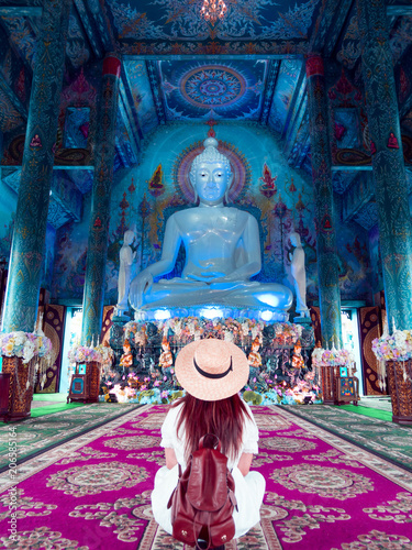 Tourist is traveling at Blue temple (Wat Rong Suea Ten) in Chiangrai, Thaialand. photo