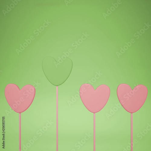 Minimal love and care concept idea, pink and green heart shape candies on pastel background with copy space