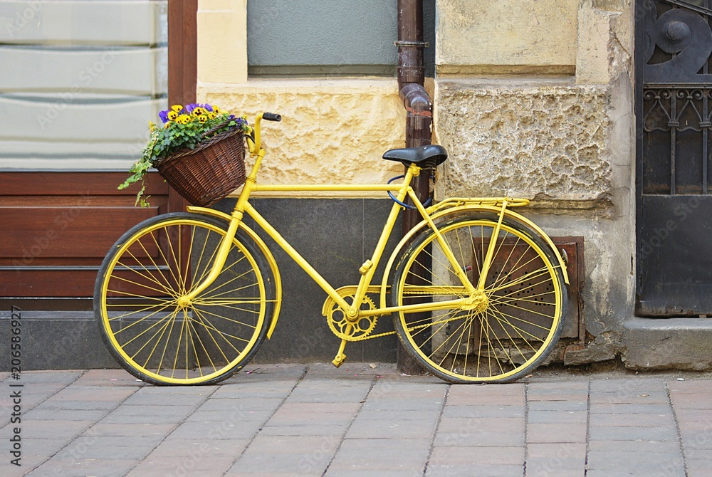 yellow bicycle in the street