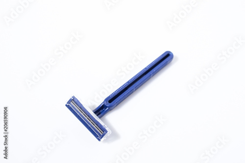 Blue shaving razor isolated in a white background